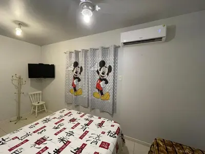 Uma cama ou camas num quarto em Casa na Praia de Palmas - 400 metros da praia