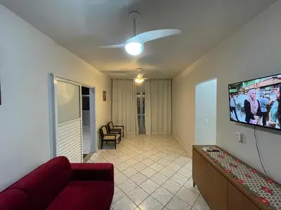 Uma televisão e/ou sistema de entretenimento em Casa na Praia de Palmas - 400 metros da praia