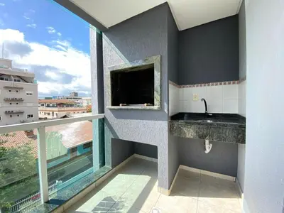 Uma varanda ou terraço em Duplex com piscina na praia de Bombinhas