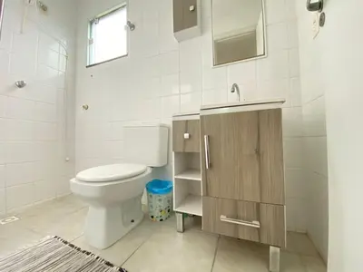 Uma casa de banho em Duplex com piscina na praia de Bombinhas