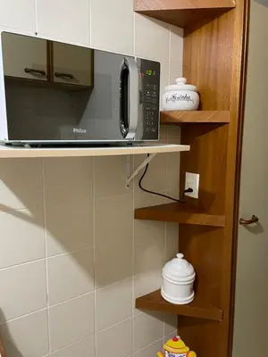 A cozinha ou kitchenette de Ap aconchegante pé na areia -10 metros da Praia