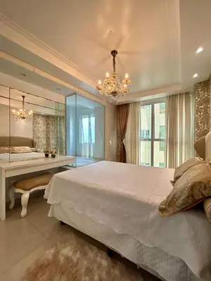 Uma cama ou camas num quarto em Apto luxuoso próximo ao mar