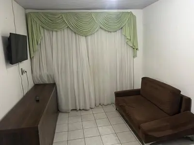 Uma televisão e/ou sistema de entretenimento em casa veraneio para famílias