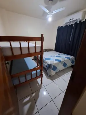 Uma cama ou camas num quarto em Apto em Itapema - Quadra MAR