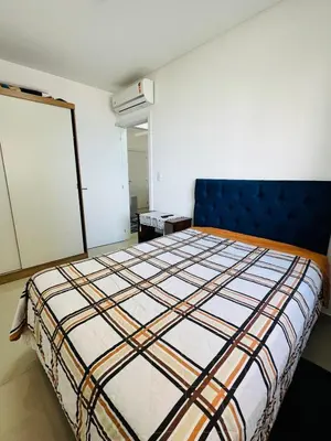 Uma cama ou camas num quarto em Mirante do mar