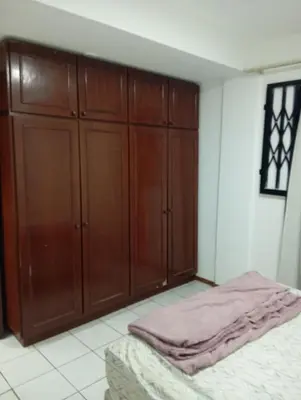 Uma cama ou camas num quarto em Apartamento Itapema