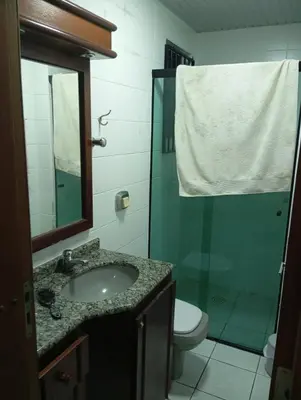 Uma casa de banho em Apartamento Itapema