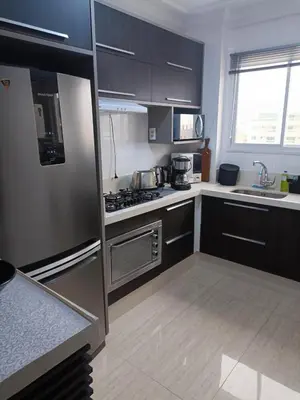A cozinha ou kitchenette de Falcão 100 mts praia de Bombas