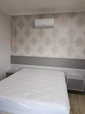 Uma cama ou camas num quarto em Falcão 100 mts praia de Bombas