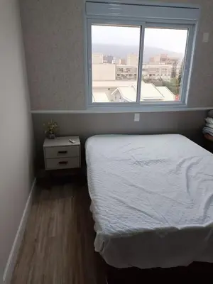 Uma cama ou camas num quarto em Falcão 100 mts praia de Bombas