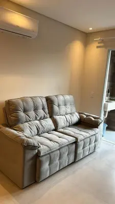 Uma área de estar em Apartamento praia de Palmas