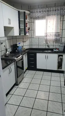 A cozinha ou kitchenette de Apartamento amplo em Meia Praia sc