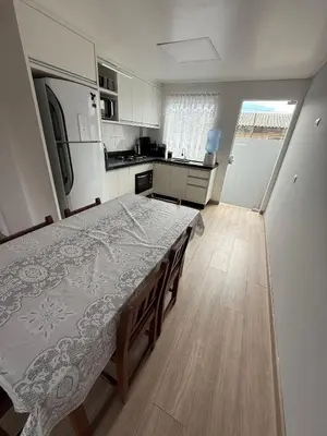A cozinha ou kitchenette de Hospedagem da Marli Bombinhas
