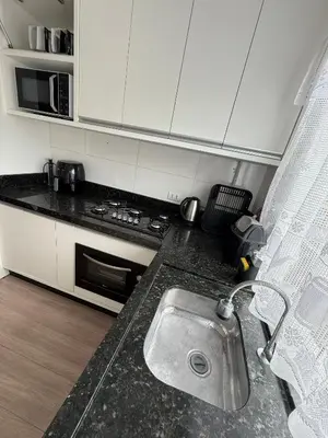 A cozinha ou kitchenette de Hospedagem da Marli Bombinhas