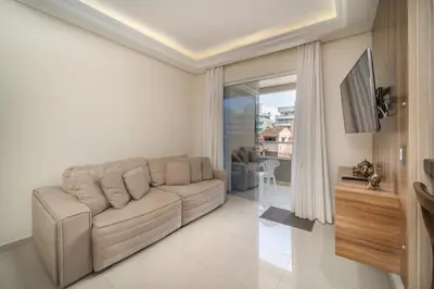 Uma área de estar em Apartamento Palazzo Em bombinhas