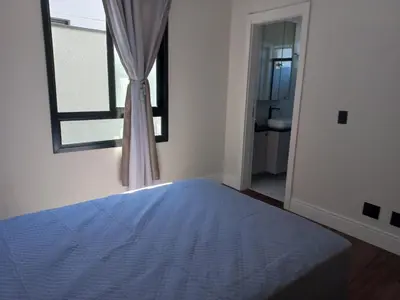 Uma cama ou camas num quarto em eveline ceszar