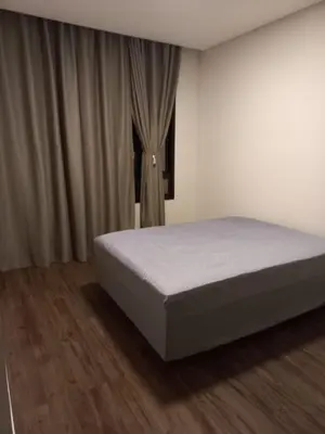 Uma cama ou camas num quarto em eveline ceszar