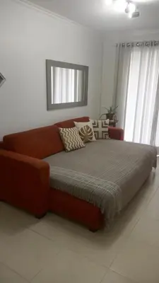 Uma cama ou camas num quarto em Apartamento quadra mar, 1 dos quartos com ar-condicionado , Barra Sul