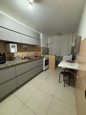 A cozinha ou kitchenette de Apartamento quadra mar, 1 dos quartos com ar-condicionado , Barra Sul