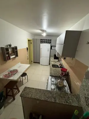 A cozinha ou kitchenette de Apartamento quadra mar, 1 dos quartos com ar-condicionado , Barra Sul