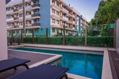 A piscina em ou perto de Apartamento Exclusivo a 600m da Praia de Palmas Piscina Banheira de Imersão aquecida rede