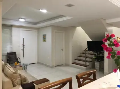 Uma área de estar em Casa 3 Quartos Praia Bombas Bombinhas SC