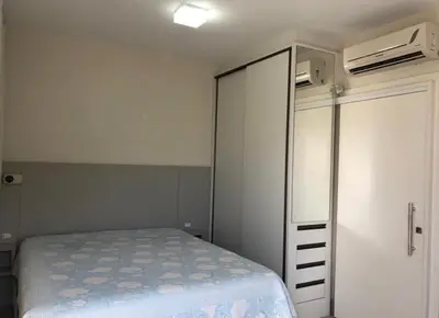 Uma cama ou camas num quarto em Casa 3 Quartos Praia Bombas Bombinhas SC