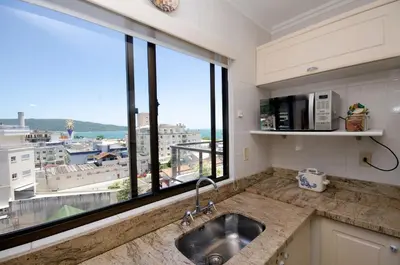 A cozinha ou kitchenette de Ed Baia Azul Centro Bombinhas