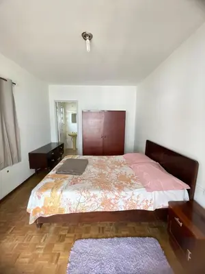 Uma cama ou camas num quarto em Casa espaçosa a 100m do mar