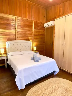 Uma cama ou camas num quarto em Casa com 2 quartos Recanto Praia das Vieiras - Porto Belo