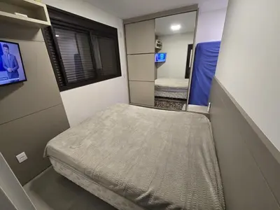 Uma cama ou camas num quarto em Apartamento Palmas Premier