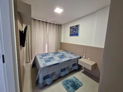 Uma cama ou camas num quarto em Apartamento Palmas Premier