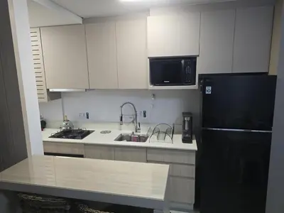 A cozinha ou kitchenette de Apartamento Palmas Premier