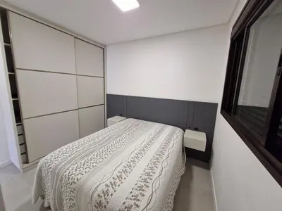 Uma cama ou camas num quarto em Apartamento Palmas Premier