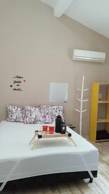 Uma cama ou camas num quarto em Casa Sunset, com vista Mares dos Ganchos, Governador Celso Ramos