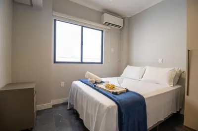 Uma cama ou camas num quarto em DCA11 - Quadra do Mar, Churrasqueira, 3 Quartos