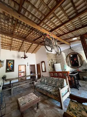 Uma área de estar em Casa Praia de Bombas 6 Pessoas - Casa Bicicleta