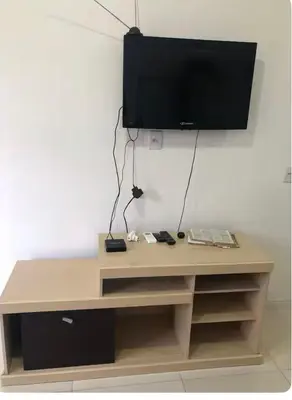 Uma televisão e/ou sistema de entretenimento em Apto Térreo -Residencial da Ju