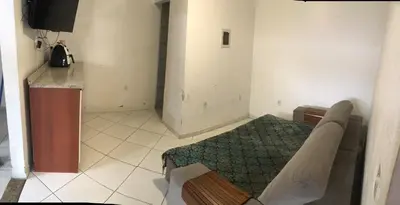 Uma área de estar em Casa Balneário Camboriú