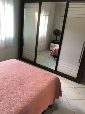 Uma cama ou camas num quarto em Casa Balneário Camboriú