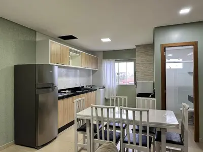 A cozinha ou kitchenette de Residencial Leão 355 - Apartamentos econômicos - 15min a pé da Praia de Bombas