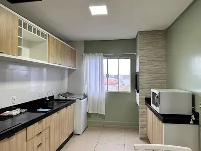 A cozinha ou kitchenette de Residencial Leão 355 - Apartamentos econômicos - 15min a pé da Praia de Bombas