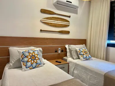 Uma cama ou camas num quarto em Perfeito! Apto estiloso em Palmas - NI01I