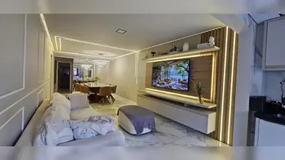 Uma televisão e/ou sistema de entretenimento em Apto dos Famosos - Conforto e Exclusividade em Meia Praia