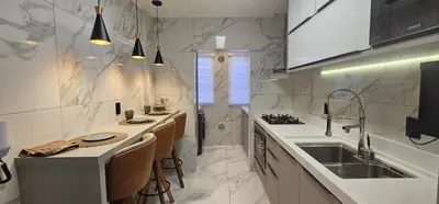 A cozinha ou kitchenette de Apto dos Famosos - Conforto e Exclusividade em Meia Praia