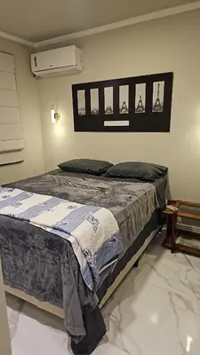 Uma cama ou camas num quarto em Apto dos Famosos - Conforto e Exclusividade em Meia Praia