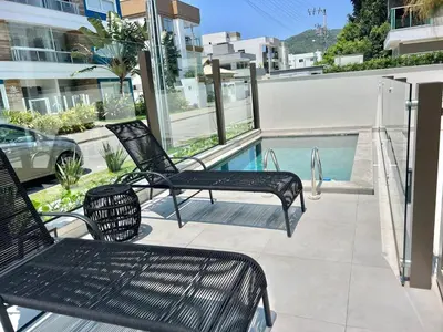 A piscina em ou perto de Lindo! Apto na praia de Palmas! BI02I