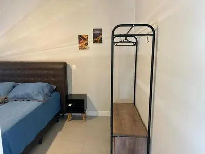 Uma cama ou camas num quarto em Lindo! Apto na praia de Palmas! BI02I