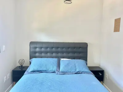Uma cama ou camas num quarto em Lindo! Apto na praia de Palmas! BI02I