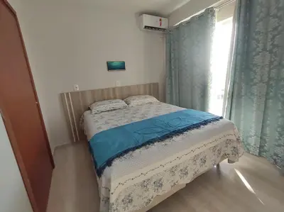 Uma cama ou camas num quarto em Morada Caixa d Aço